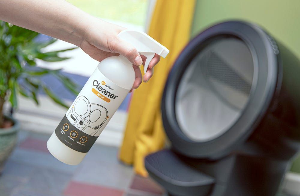 Whisker cleaner spray in front of Litter-Robot 4