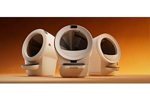 siberian cat inside Litter-Robot 4 automatic cat litter box next to Litter-Robot 3 Connect
