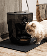 new Whisker.com Siberian cat eating from Feeder-Robot in black smoke thumbnail