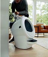 Man refilling Litter-Robot 4 through the LitterHopper accessory thumbnail
