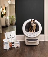 cat in white Litter-Robot 4 with greatlitter odortrap and waste drawer liners on the side thumbnail