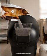 Litter-Robot 4 self-cleaning litter box with LitterHopper accessory being refilled at the back of the unit thumbnail