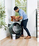 WCOM man pouring Lit into Litter-Robot 4 thumbnail