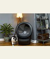 calico cat by black Litter-Robot 4 with fence thumbnail