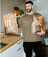 LBDC man holding two bags of Lit premium cat litter thumbnail
