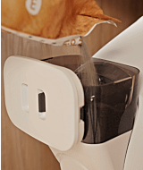 WCOM pouring litter into Litter-Robot 5 LitterHopper thumbnail