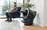 cat using Litter-Robot 4 with LitterHopper while man sits with another cat on his lap Thumbnail