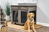 Golden Retriever sitting in front of barrister dog crate Thumbnail