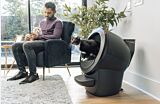 Litter-Robot 4 self cleaning litter box with LitterHopper automatic litter refiller inside a home with multiple cats Thumbnail