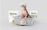 kitten in litter box with odortrap packs Thumbnail