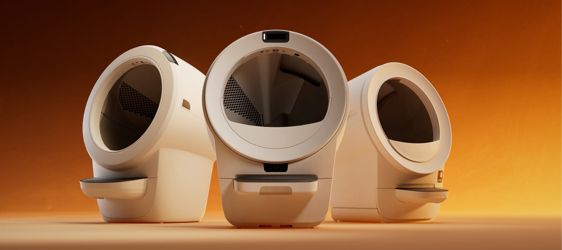 siberian cat inside Litter-Robot 4 automatic cat litter box next to Litter-Robot 3 Connect