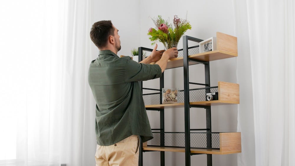 cat proofing a home by removing items placed high on a shelf and plants toxic to cats