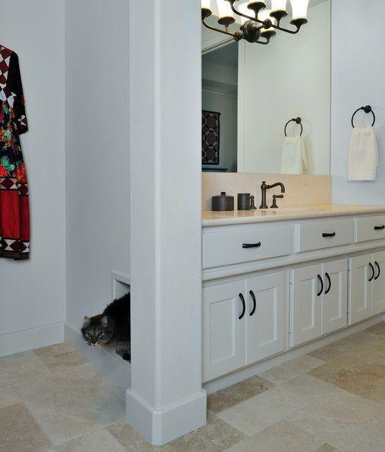 hidden litter box cabinet in bathroom