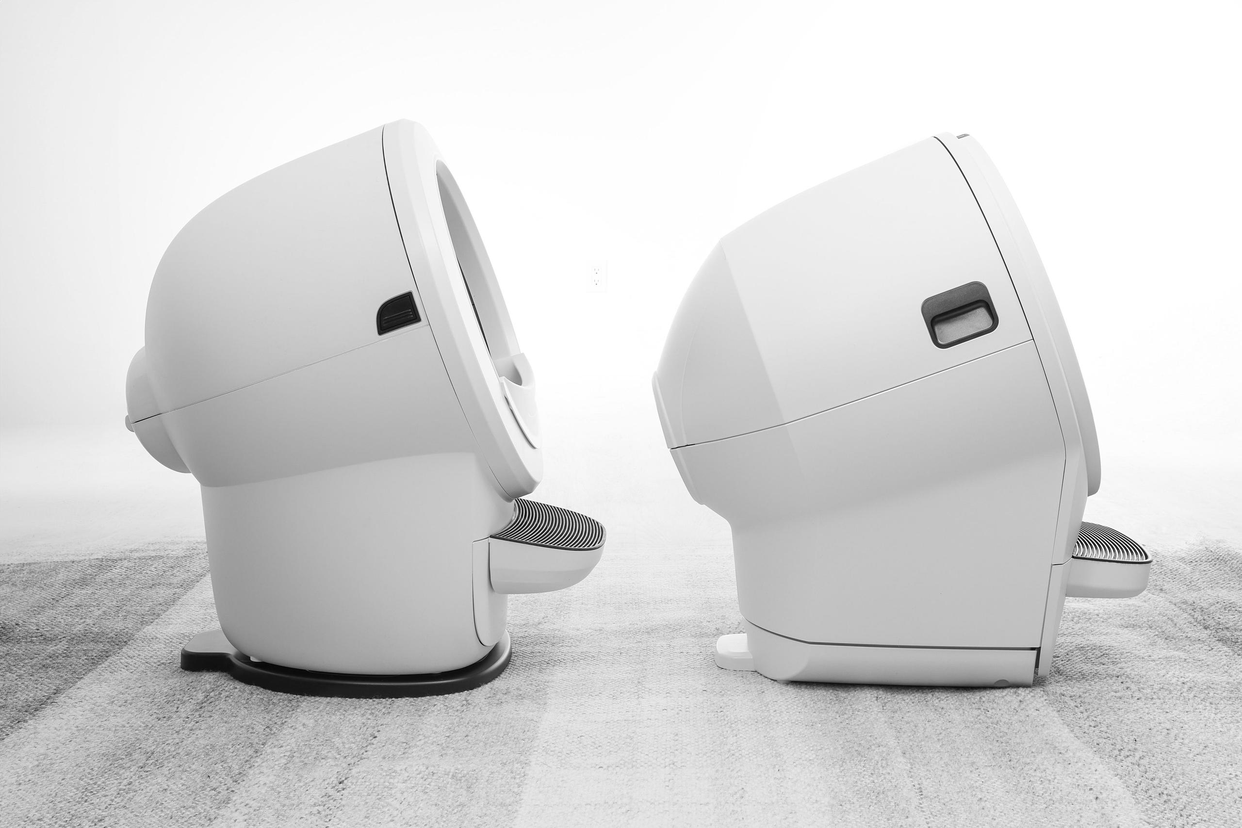 Litter-Robot 4 on Carpet Tray next to Litter-Robot 5 without Carpet Tray