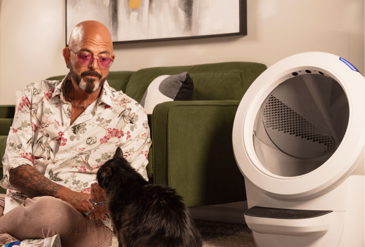 A family holding a cat.