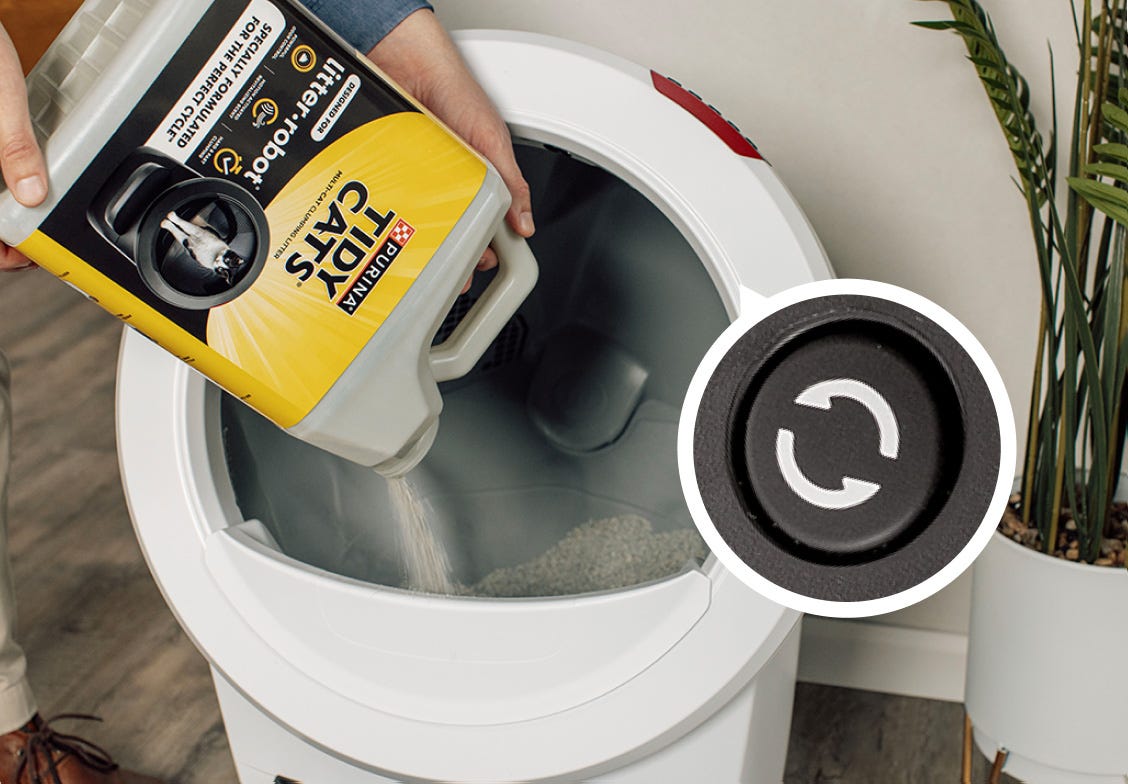 Litter-Robot 4 getting filled with litter. 