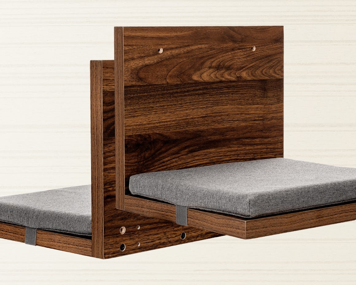 Two cat shelves showing mounting holes and cushions