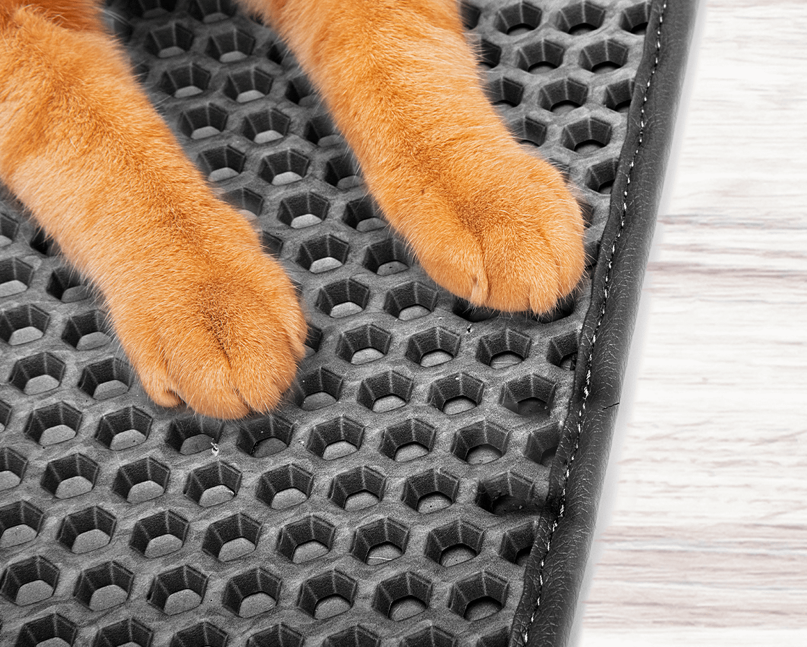 orange cat paws on black Litter Trap Mat