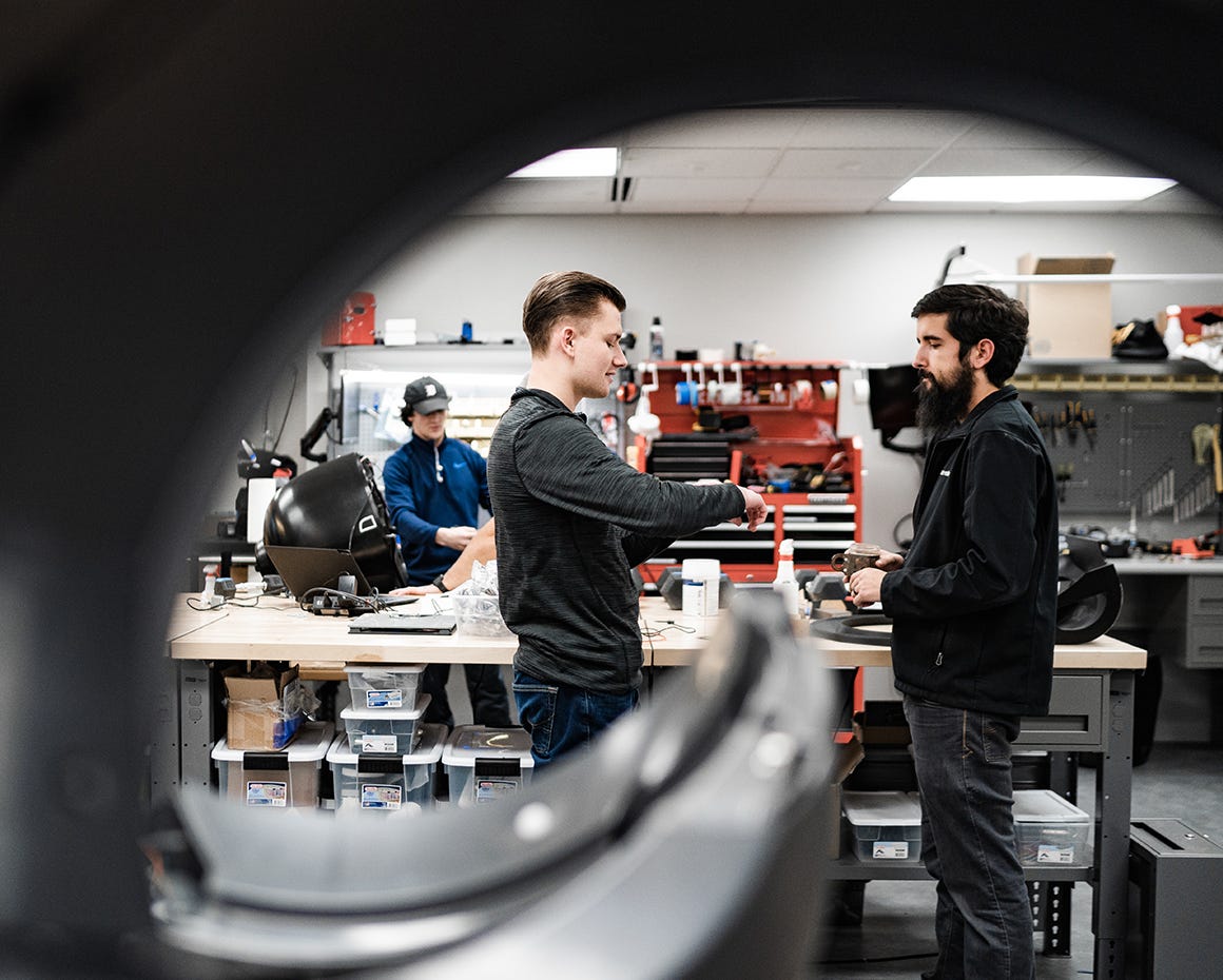 2 Whisker employees in warehouse