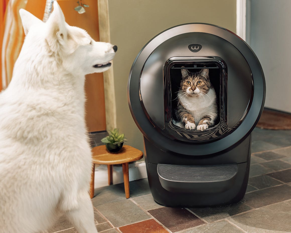 woman installing Litter-Robot 4 Shield
