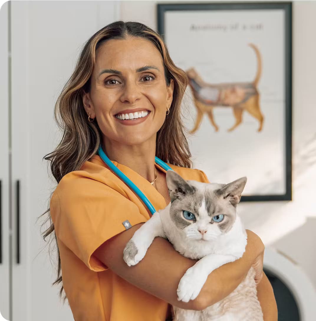 Veterinarian Anna Foster with Francois the cat in her arms