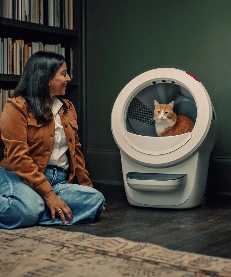 woman and cat with Litter-Robot